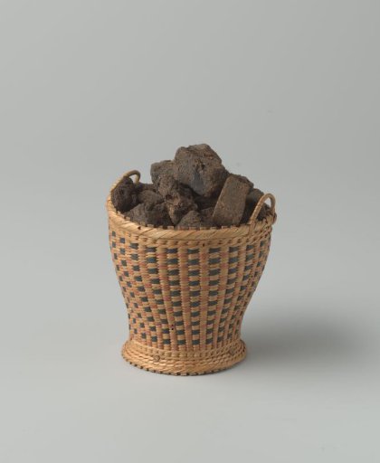 Peat basket with peat, made of split willow twigs