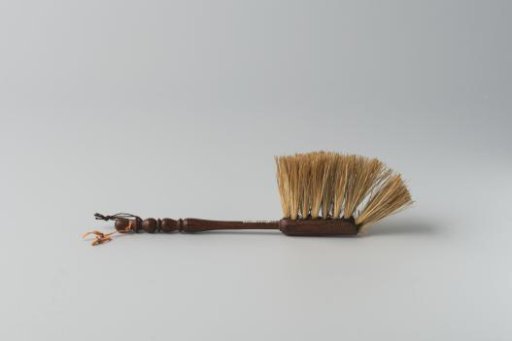 Dustpan of rosewood and boar's hair