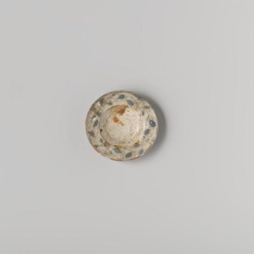 Plate, turned from wood, painted in blue on white with floral motifs