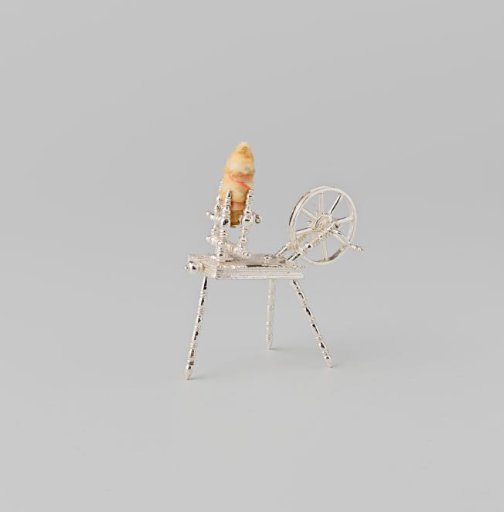 Silver spinning wheel