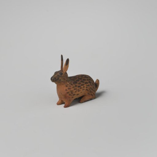 Rabbit, brown with black spots