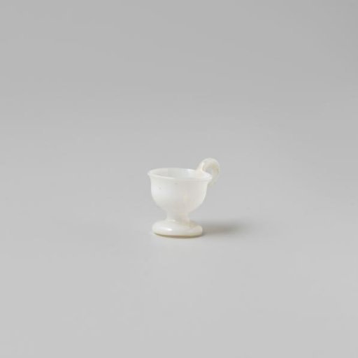 Cup with handle, painted with a flower in white, red and green