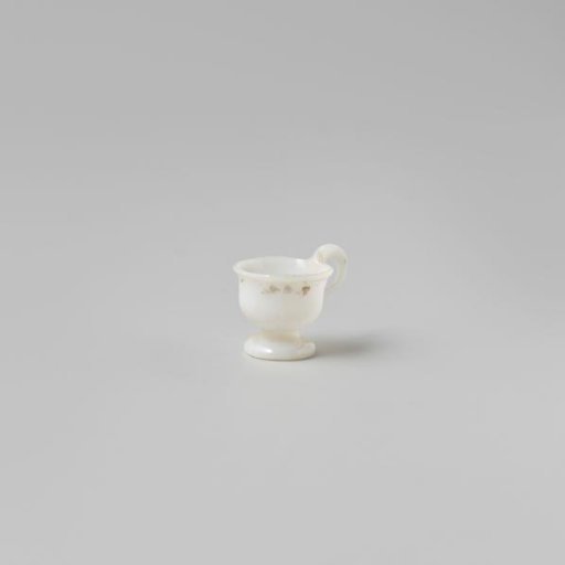 Cup with handle, painted with a flower in white, red and green