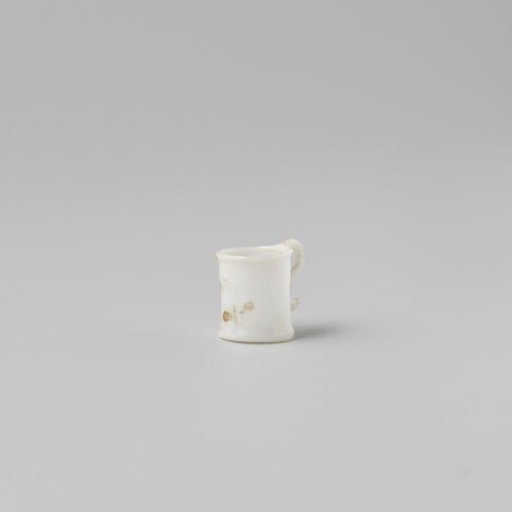 Cup with handle, painted with a flower in white, red and green