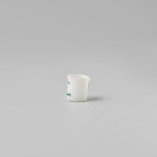 Cup with handle, painted with a flower in white, red and green