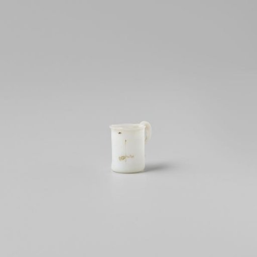 Cup with handle, painted with a flower in white, red and green