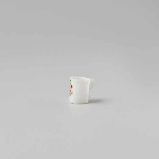 Cup with handle, painted with a flower in white, red and green