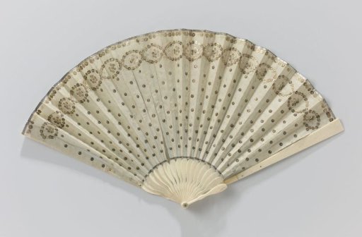 Folding fan with leaf of cream-colored silk with gold-colored flowers, mount of ivory (?)