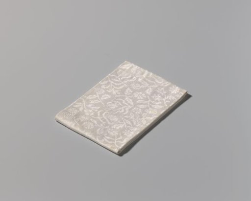 Mirrored floral pattern, border: winding floral vine with birds and block border