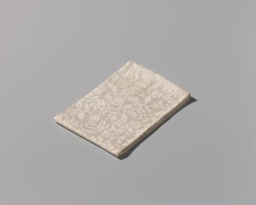 Mirrored floral pattern. Border: winding floral vine with birds and block border.