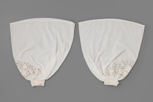 Under-sleeve of batiste, decorated with rose branches and vines in openwork plumetis embroidery