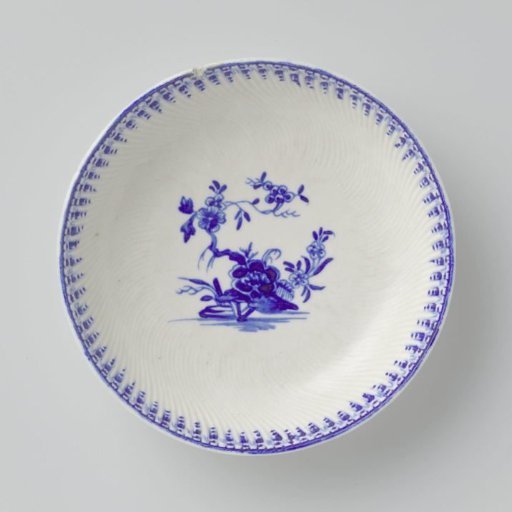Saucer with flowering plants