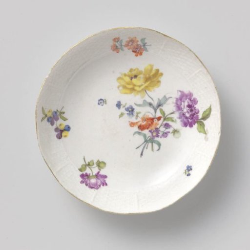 Plate, multicolored painted with flower bouquets
