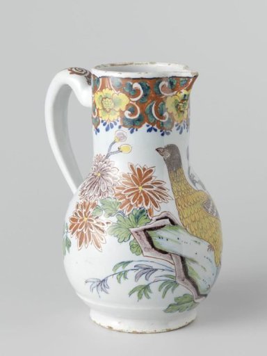 Faience jug, polychrome painted with a bird and flowers. With separate silver lid
