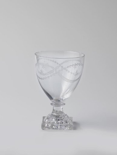 Goblet on a square foot with interlacing leaf scrolls and stars