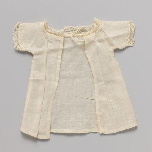 Shirt for a doll. Neck and sleeves trimmed with Valenciennes lace