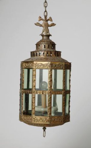 Lantern of brass with green glass