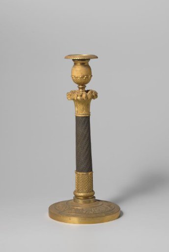 Candelabrum of partially gilded bronze, decorated with rosettes and crowned by a basket with flowers and fruit