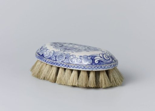 Back of a brush, painted with vines and floral motifs, the initials AH and the year 1757