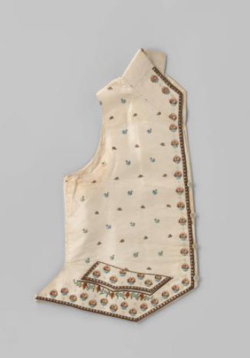 Waistcoat of cream-colored taffeta with a high standing collar, diagonally cut skirt, and sewn-on flaps without pockets.