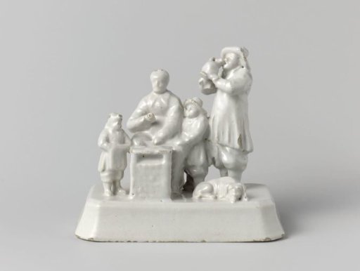 Waffle baker behind stove, two children and a drinking man with dog at his feet