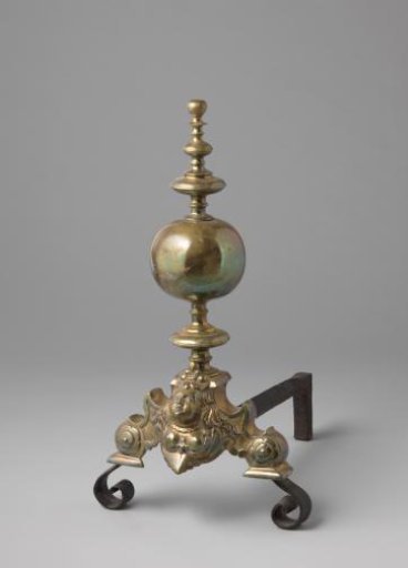 Fire iron decorated with the bust of a woman and a sphere