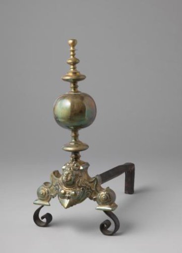 Fire iron decorated with the bust of a woman and a sphere