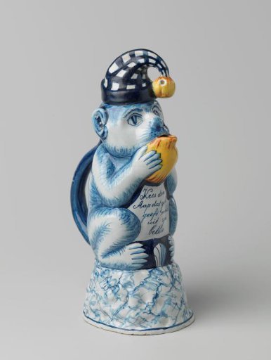 Mug in the shape of a monkey wearing a cap
