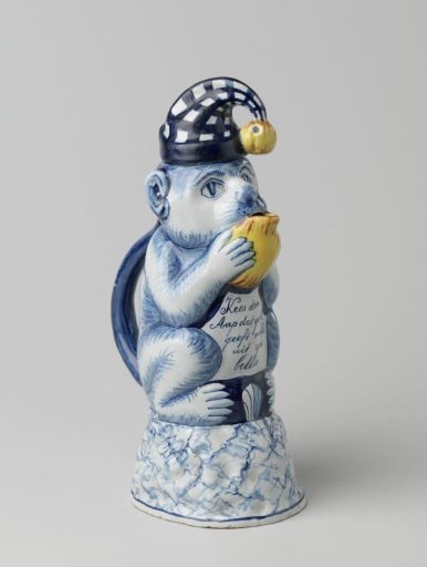 Can in the shape of a muzzled monkey