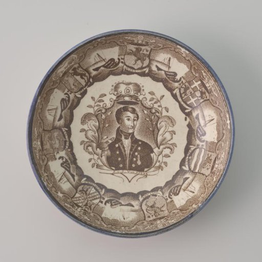 Plate of hard-baked earthenware with brown transfer decoration