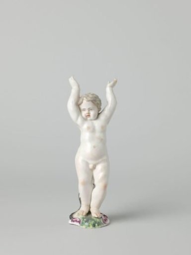 Boy with arms raised