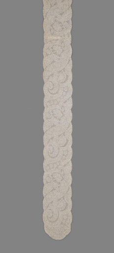Lace caps of bobbin lace sewn together