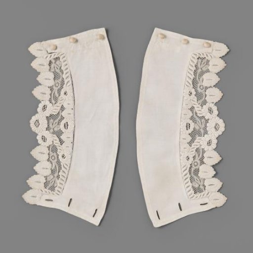 Cuff of linen batiste decorated with embroidery and bobbin lace