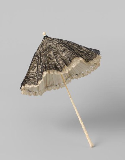 Parasol with a cover of black Chantilly lace on white taffeta, lined with white pongee silk, with a carved ivory stick