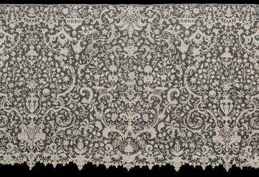 Alabaster strip of needle lace with symmetrical pattern of flower vases and baldachins