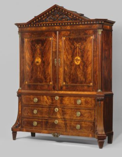 Cabinet, decorated with marquetry in various wood types. On the doors with ribbons hung medallions containing a sailing ship on the left and musical instruments on the right.