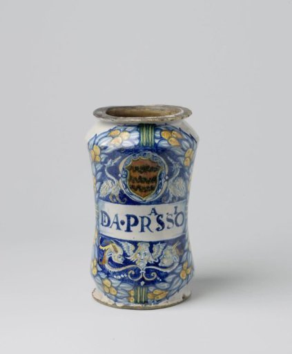 Albarello, multicolored painted with a coat of arms featuring the head of a griffin on either side and a scroll with inscription: DA PRASSIO