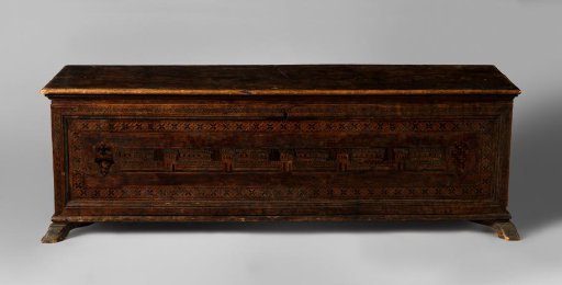 Chest of walnut decorated with intarsia of various wood species and with an interior of poplar wood