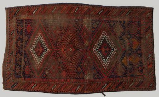 Carpet, decorated with diamonds and triangles and geometric ornaments.