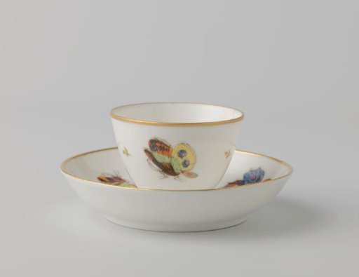 Cup painted with butterflies and dragonflies