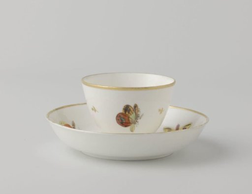 Cup and saucer painted with butterflies and dragonflies
