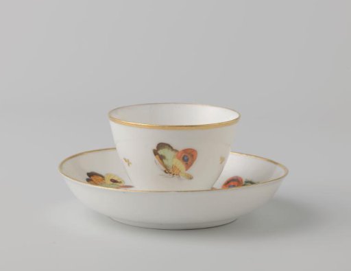 Cup painted with butterflies and dragonflies