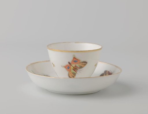Saucer painted with butterflies and dragonflies