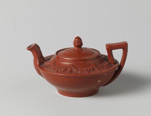 Lid of red stoneware, children's toy.