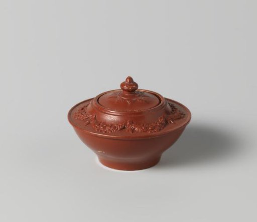 Sugar bowl of red stoneware, children's toy.