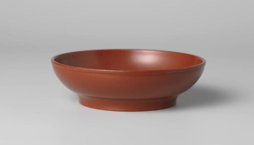 Washbasin of red earthenware, children's toy.