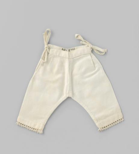 White linen doll's underpants with a bow on each hip