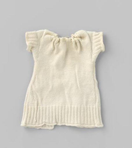 Knitted white cotton shirt for doll