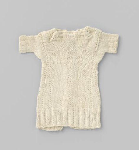 Knitted white cotton shirt for doll
