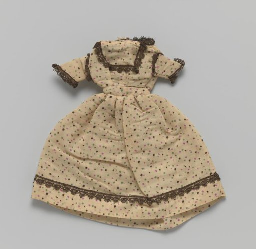Gown of beige linen with spots in pink, green and black